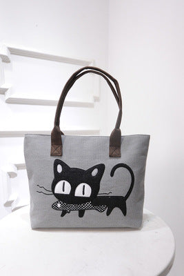 Cartoon cats eat fish handbags for ladies